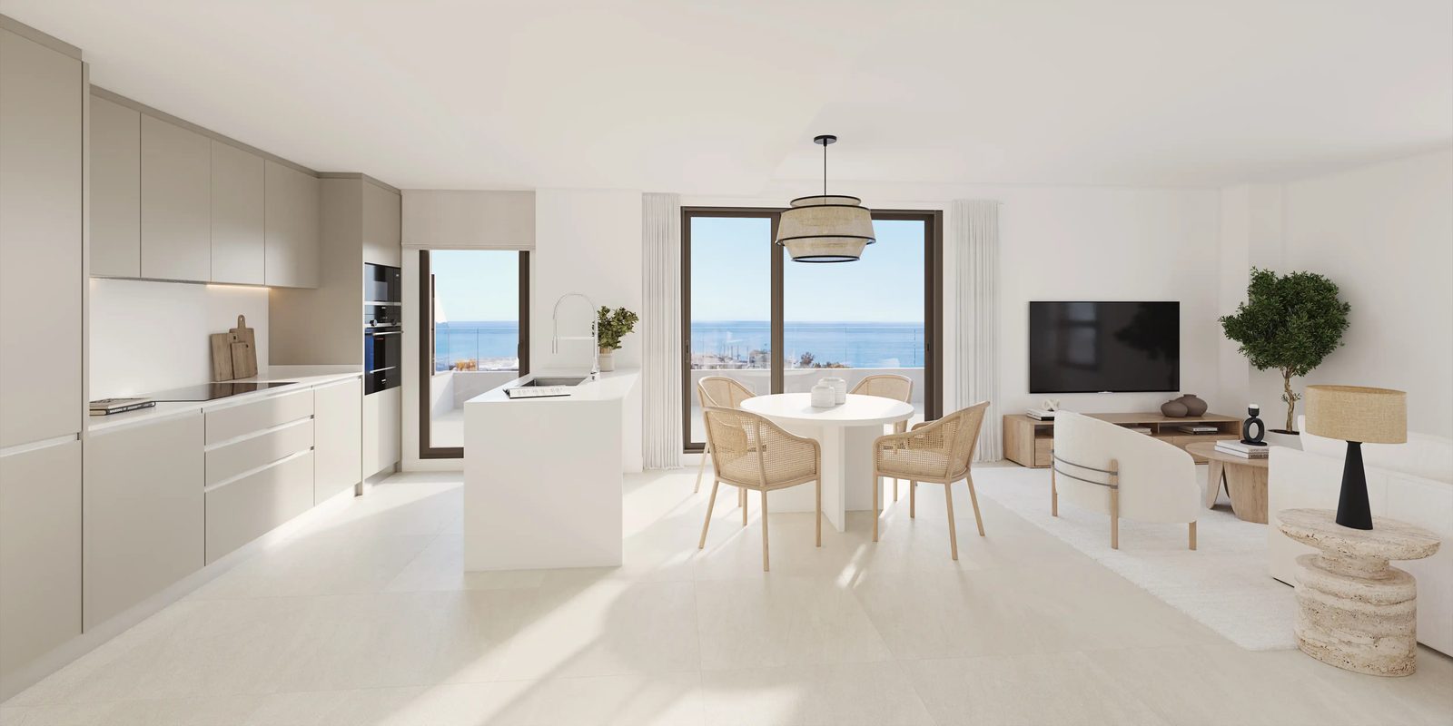 Modern kitchen and dining area with sea views in a 4-bedroom penthouse in Villajoyosa - The Estates