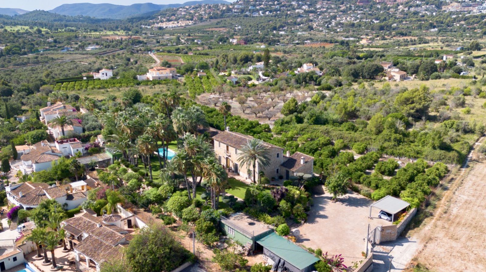 An aerial view of the finca and surrounding countryside in La Xara, Denia - The Estates
