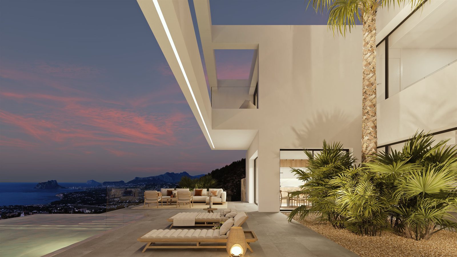 Modern villa exterior with sea and mountain views, a garden, and city lights - The Estates