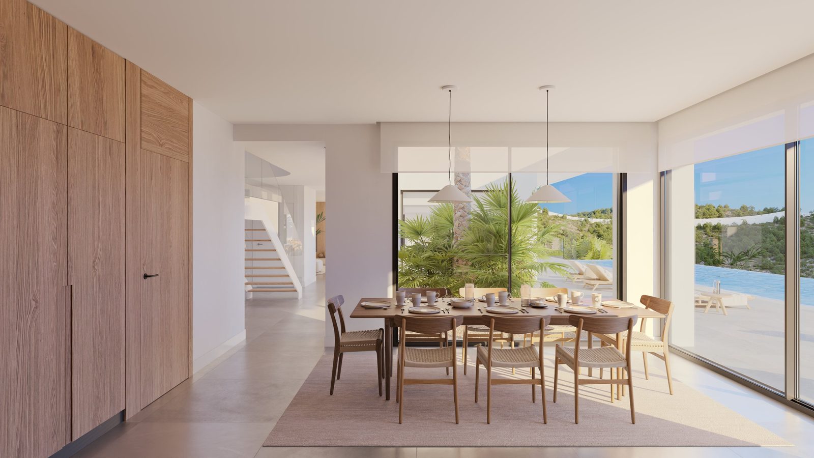 Bright dining area with stunning sea and garden views inside a 4-bedroom villa in Benissa - The Estates