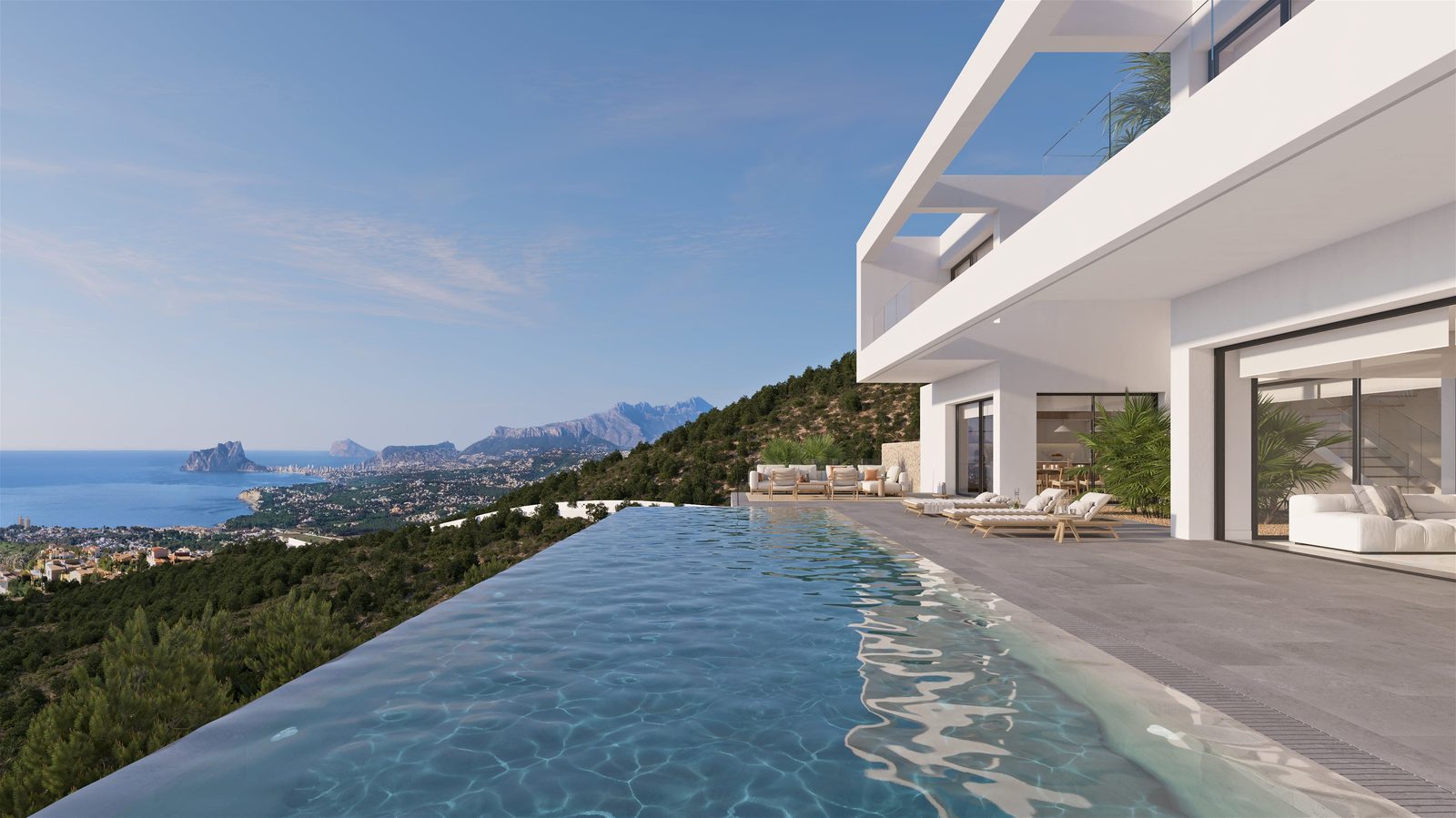 Stunning sea and mountain views from the pool of a 4-bedroom villa in Benissa - The Estates