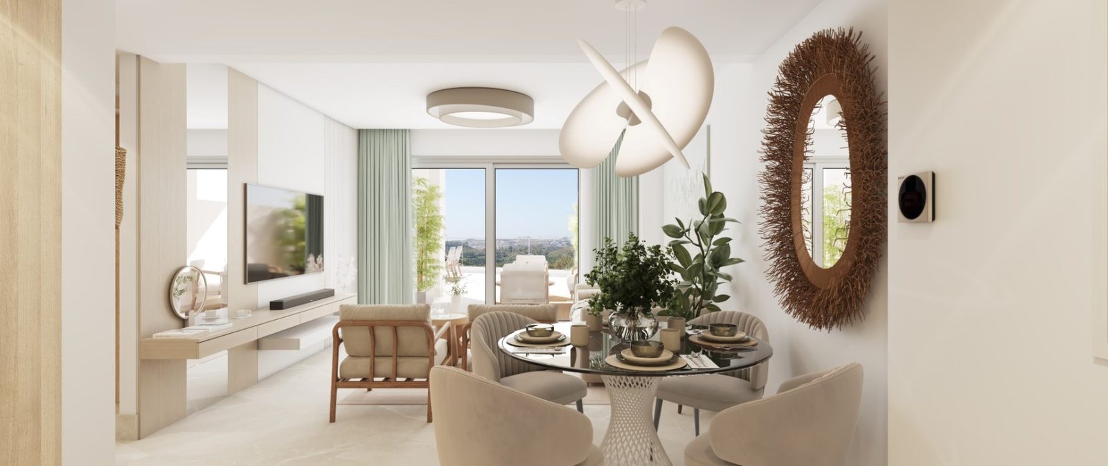 Contemporary open-plan living and dining area with balcony views of a 2-bedroom apartment in Las Lagunas de Mijas - The Estates