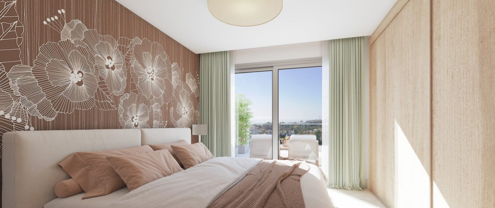 Bright bedroom with floral feature wall, fitted wardrobes and terrace views in a 2-bedroom apartment in Las Lagunas de Mijas - The Estates