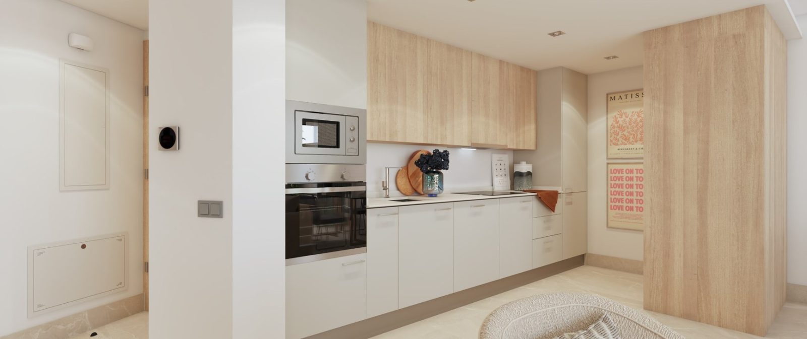 Contemporary fitted kitchen with wood cabinetry and integrated appliances in a 2-bedroom apartment in Las Lagunas de Mijas - The Estates