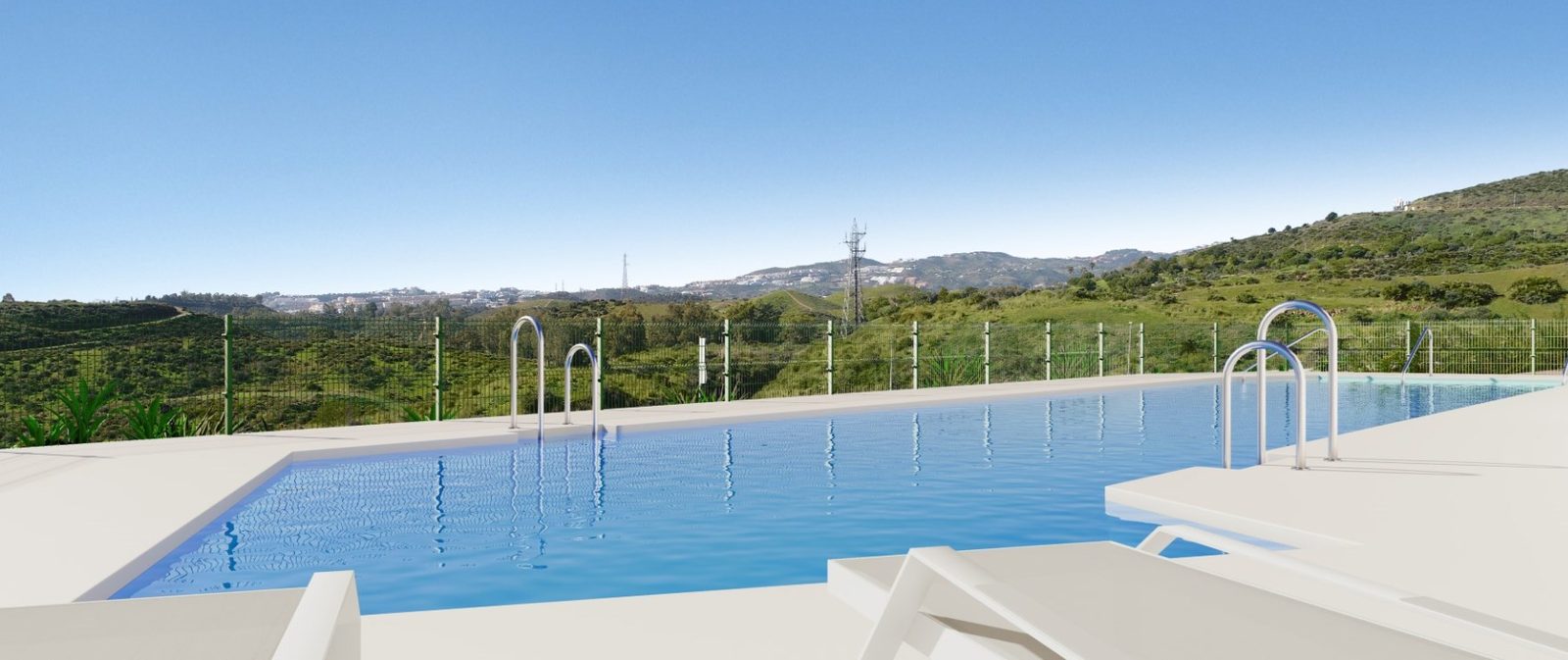 Communal swimming pool with countryside and hillside views of a 2-bedroom apartment in Las Lagunas de Mijas - The Estates
