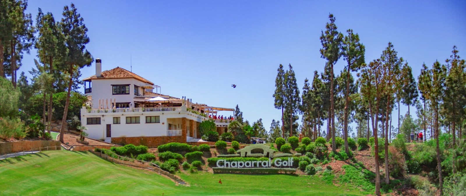 Chaparral Golf Club clubhouse and landscaped grounds of a 2-bedroom apartment in Las Lagunas de Mijas - The Estates