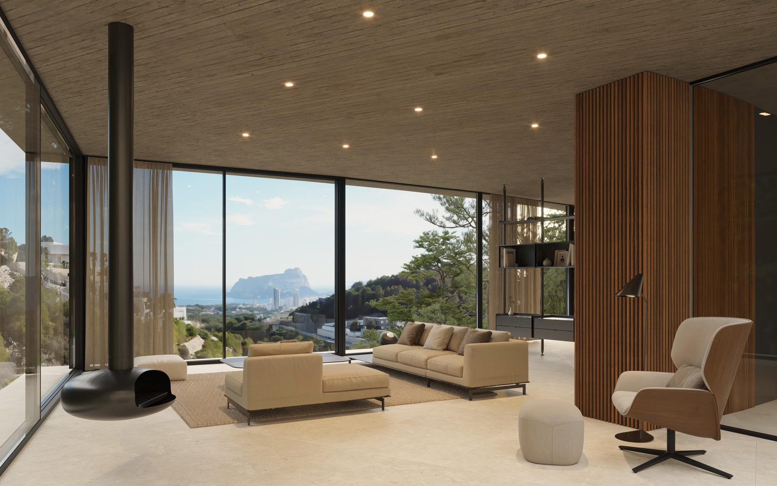 Stylish living room with a fireplace and stunning sea views in a 4-bedroom villa in Benissa - The Estates