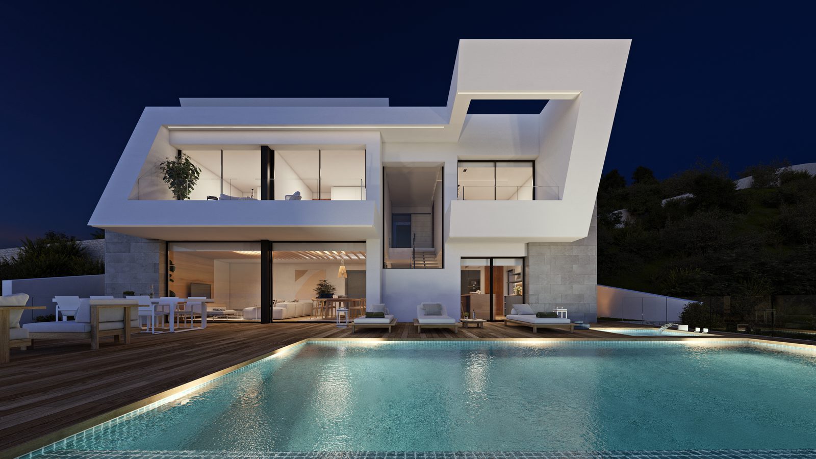 Modern 3-bedroom villa exterior with illuminated pool and terraces at night in Benitachell - The Estates