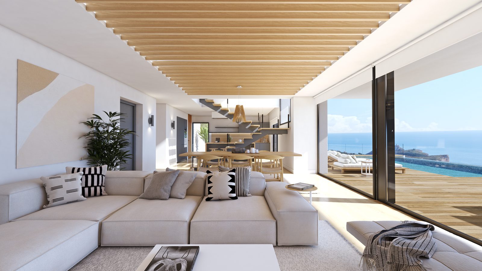 Open-plan living and dining area with sea views of a 3-bedroom villa in Benitachell - The Estates