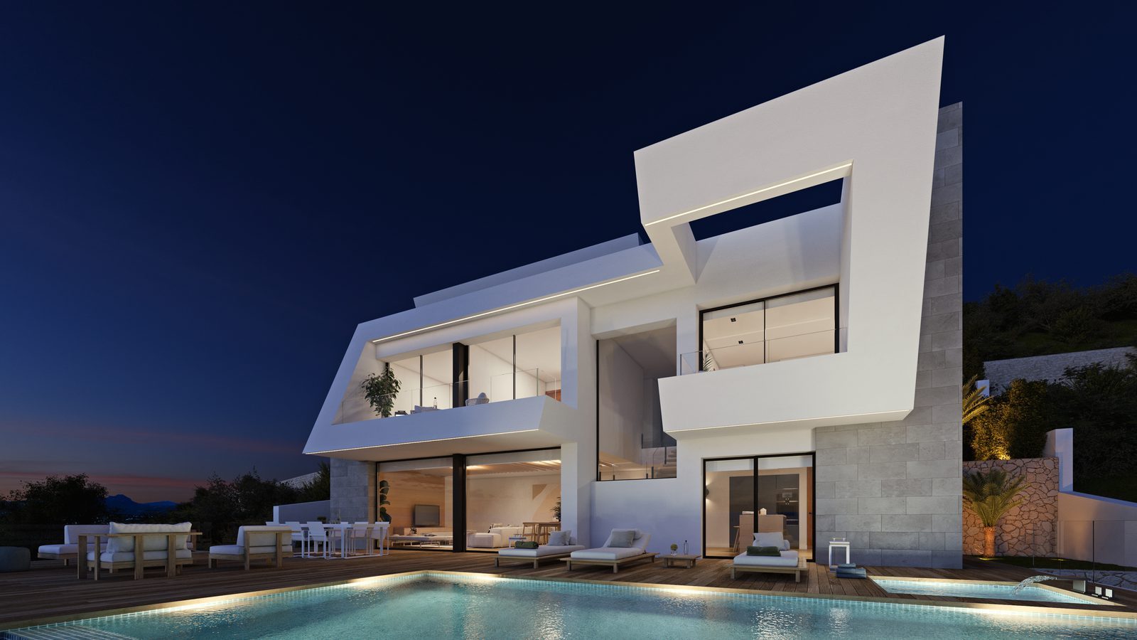 Modern villa with illuminated pool, terraces and sea views at dusk in Benitachell - The Estates