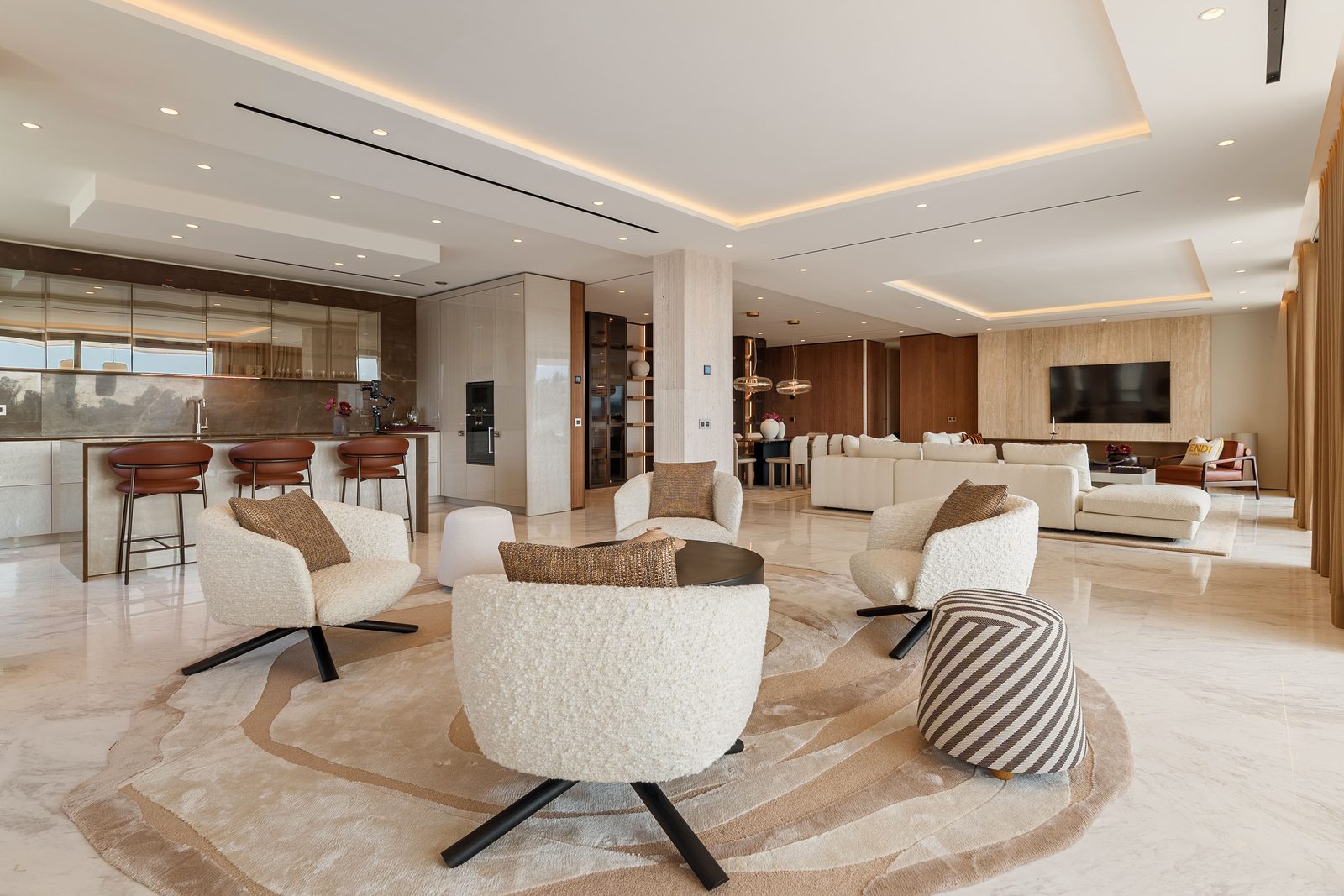 Open-plan living room and kitchen of a 4-bedroom penthouse in Málaga - The Estates