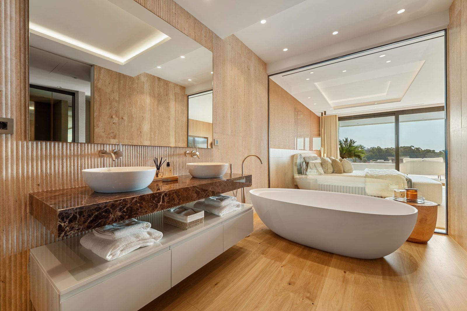 Luxury bathroom with freestanding bathtub and double vanity of a 4-bedroom penthouse in Málaga - The Estates