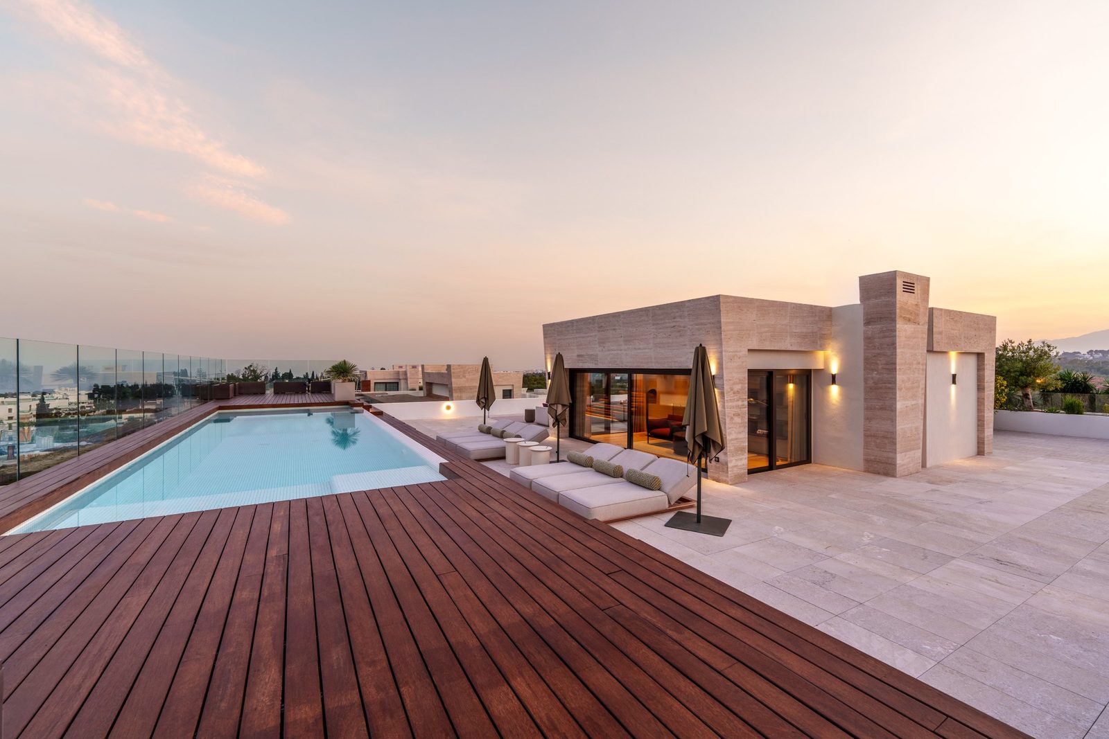 Rooftop terrace with pool, loungers and sea and