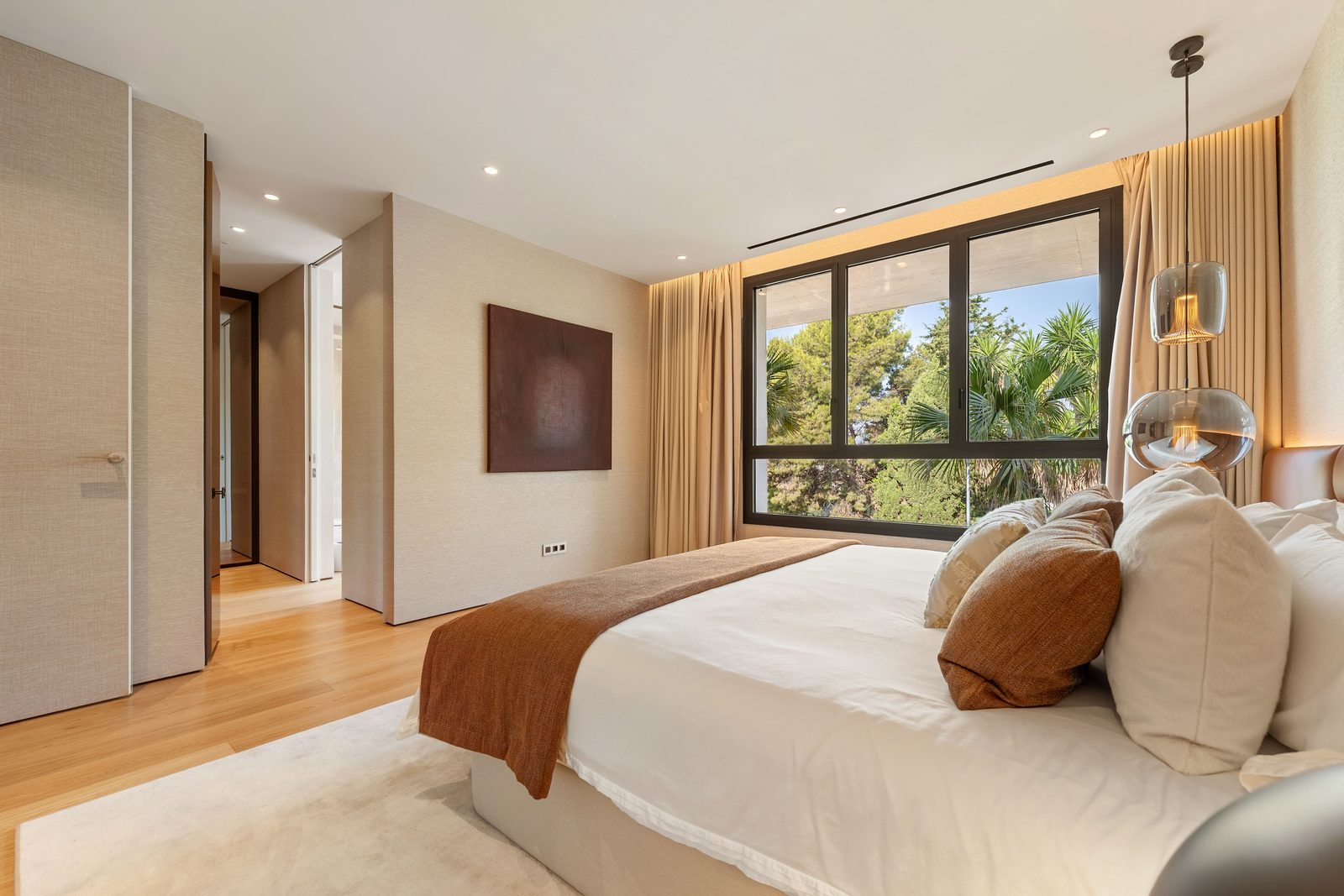 Contemporary bedroom with garden views in a 4-bedroom penthouse in Málaga - The Estates