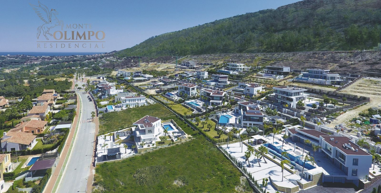 Aerial view of Monte Olimpo villas, countryside and mountain landscape of a 4-bedroom villa in Jávea - The Estates