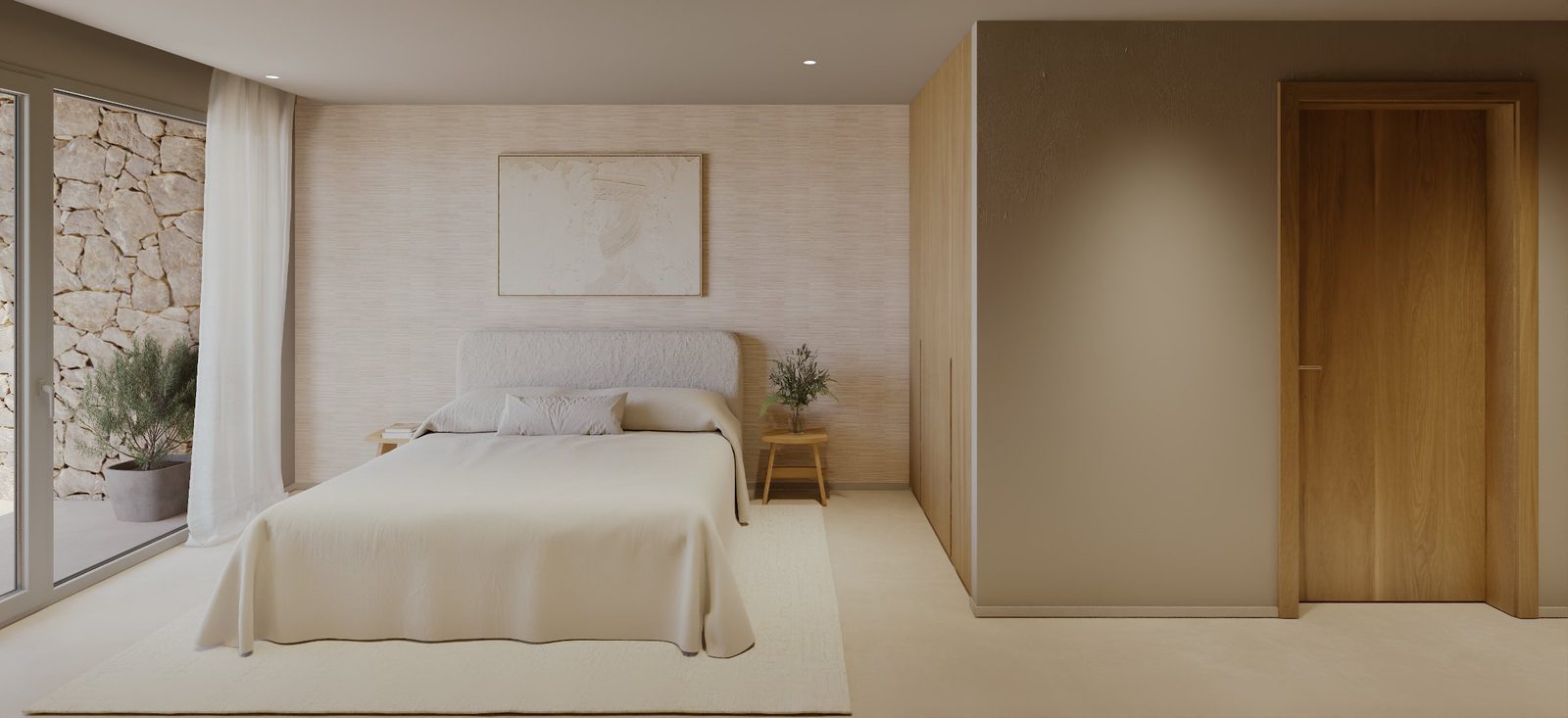 A bright bedroom with a double bed and stone accent wall in a 3-bedroom villa in Lliber - The Estates