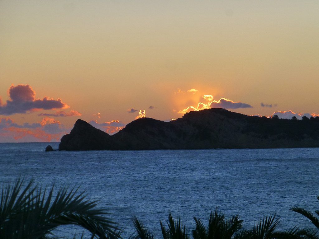 Sunset over the sea and rugged coastline viewed from a 4-bedroom villa in Jávea - The Estates
