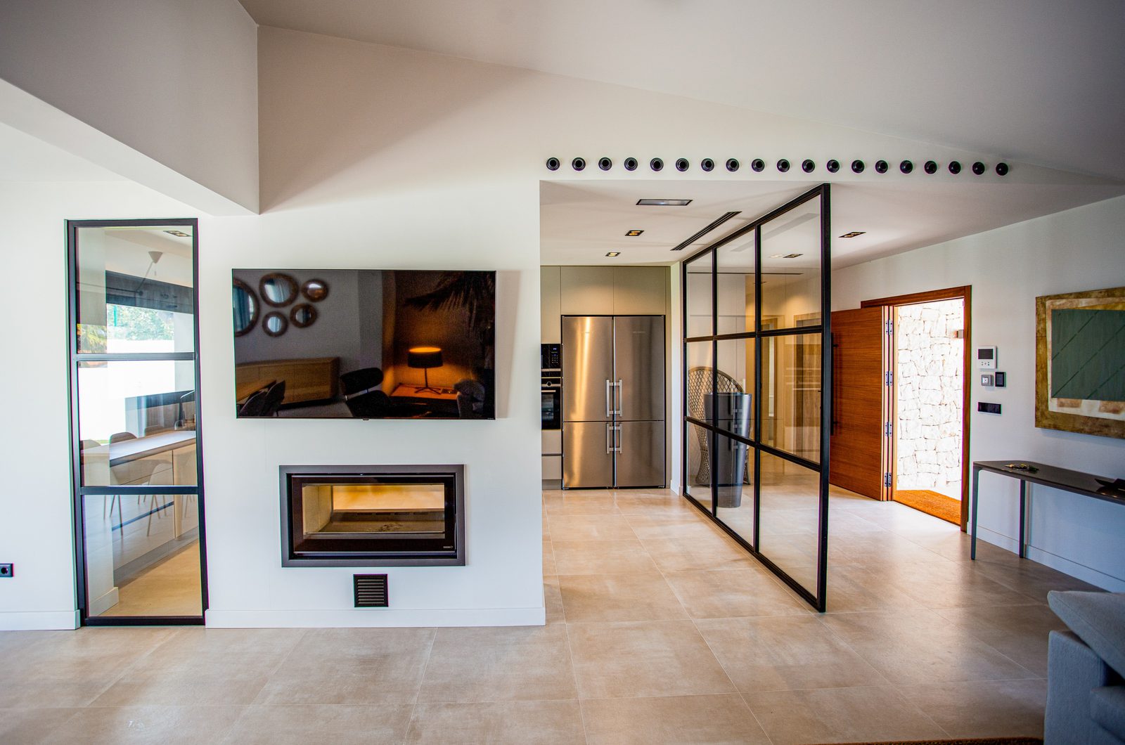 Modern kitchen and living area of a 3-bedroom villa in Denia - The Estates