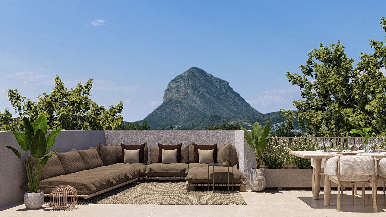 Rooftop terrace with lounge seating, dining table and mountain views of a 3-bedroom penthouse in Jávea - The Estates