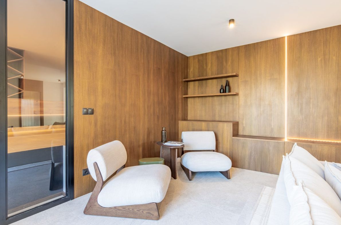 Stylish interior with seating area and built-in shelving in a 5-bedroom villa in Benitachell - The Estates