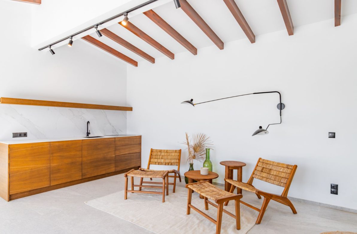 Stylish interior with wooden details and seating area of a 5-bedroom villa in Benitachell - The Estates