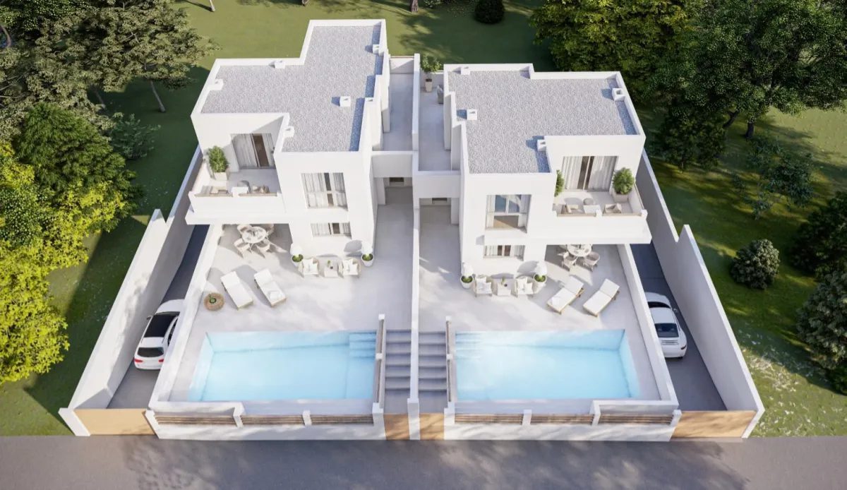 Aerial view of a modern 3-bedroom villa with private pool, terraces and landscaped gardens in Alfaz del Pi - The Estates