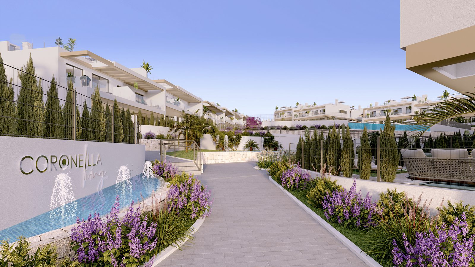 Exterior view of a modern 2-bedroom bungalow complex with a fountain and landscaping in Torrevieja - The Estates