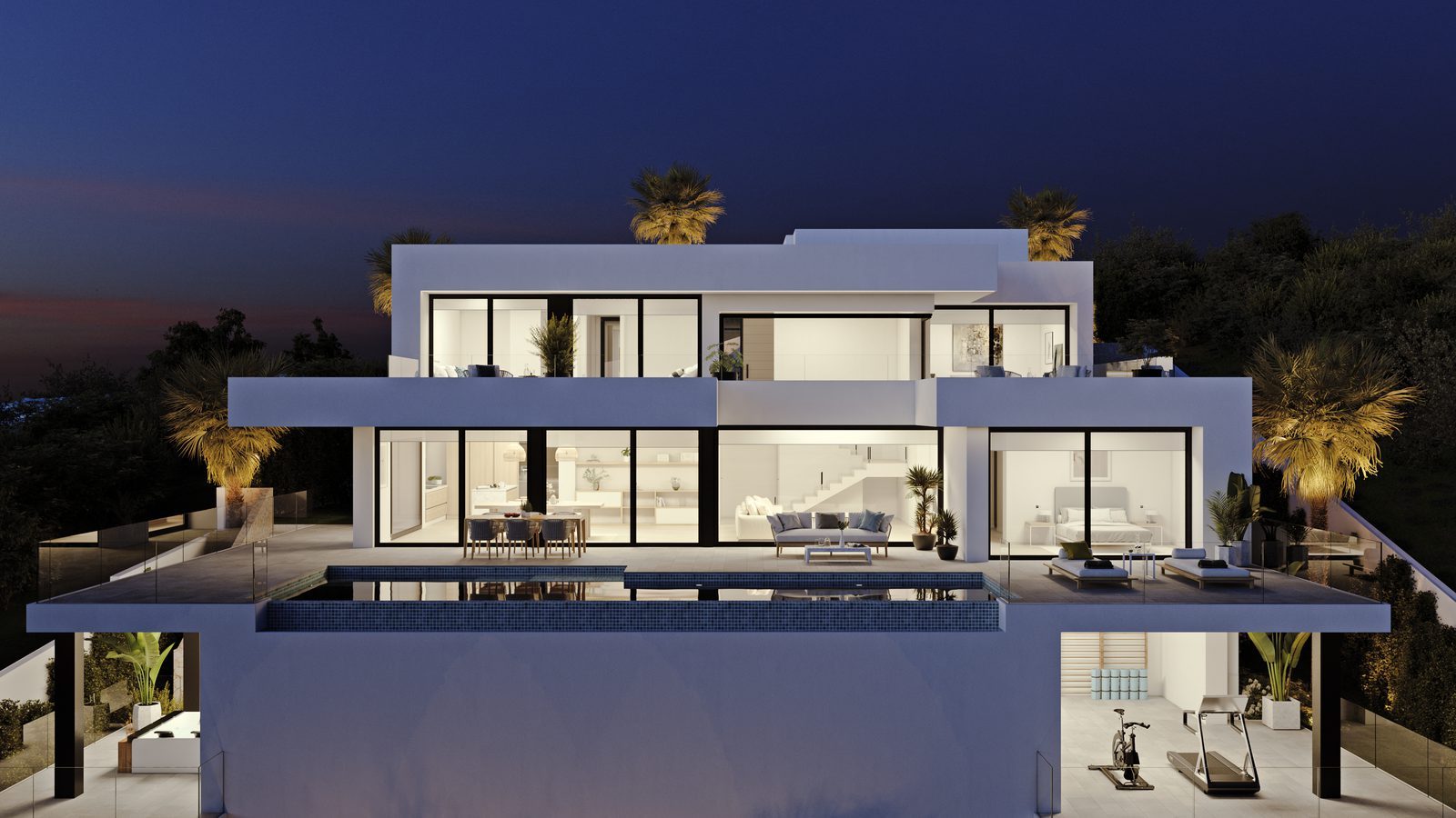 Twilight exterior with pool and terraces of a 4-bedroom villa in Benitachell - The Estates