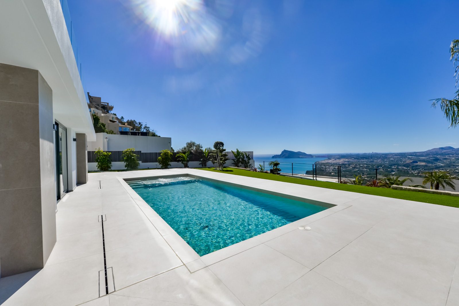 Infinity pool and sun terrace overlooking panoramic sea views from a modern villa in Altea Hills - The Estates