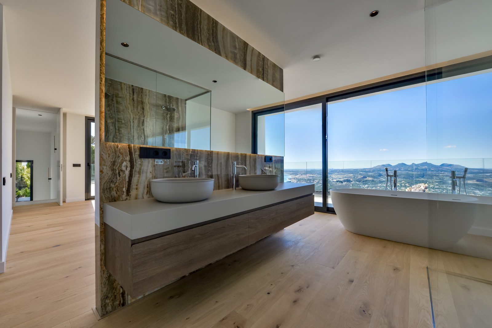 Luxury bathroom with freestanding tub and panoramic sea views of a 4-bedroom villa in Altea - The Estates