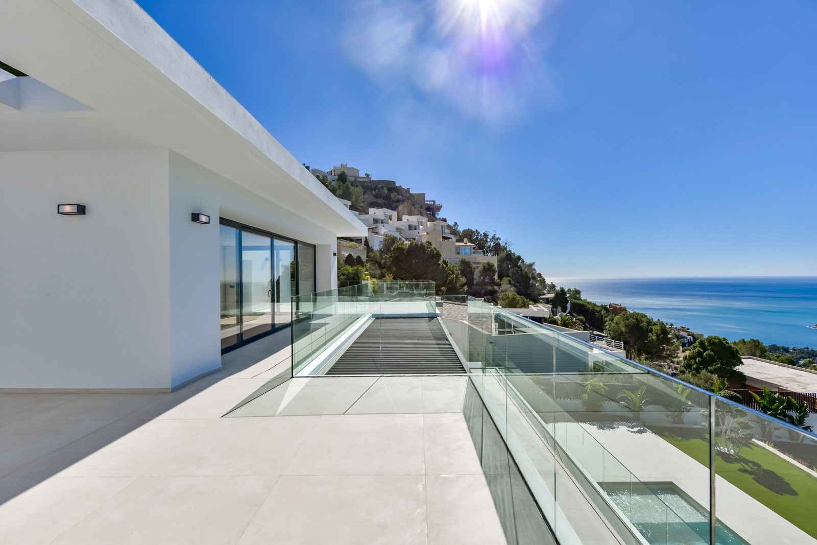 Sea-view terrace with glass railings at a 4-bedroom villa in Altea - The Estates
