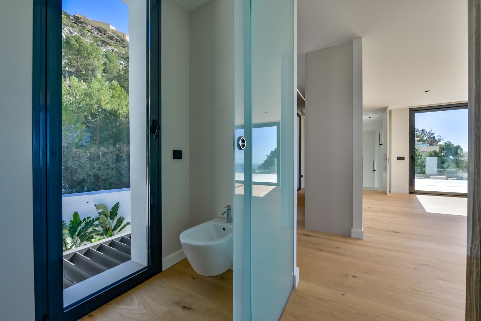 Modern bathroom and hallway with sea views in a 4-bedroom villa in Altea - The Estates