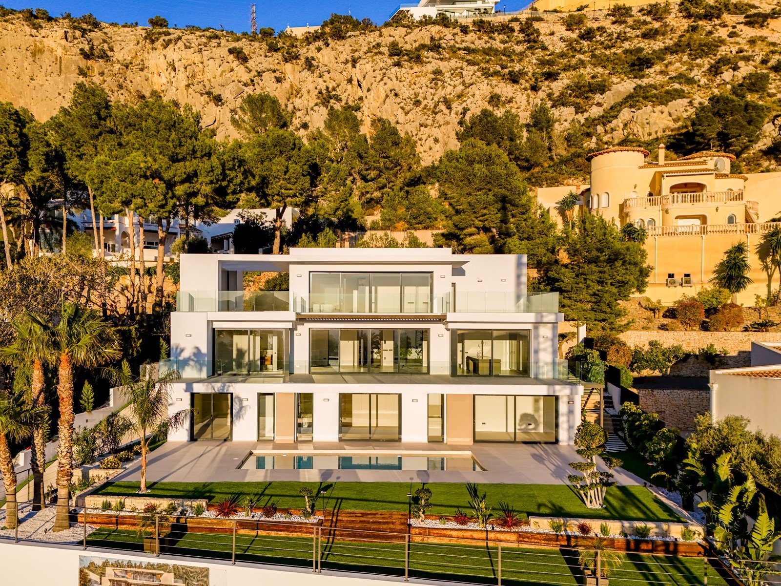 Modern exterior of a 4-bedroom villa with pool and landscaped garden in Altea Hills - The Estates