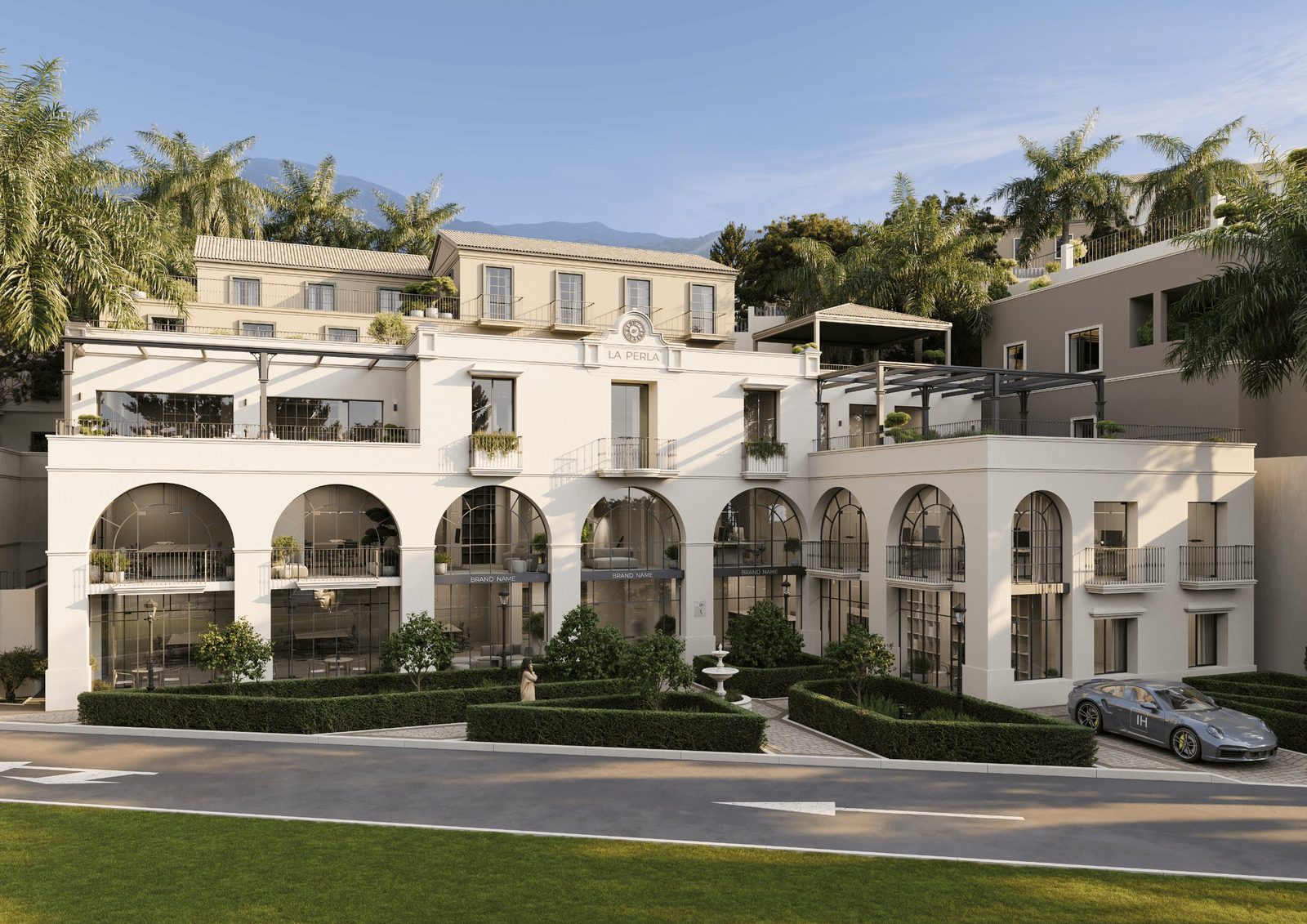 Exterior view of La Perla property with arched façade, terraces and landscaped gardens in Benah