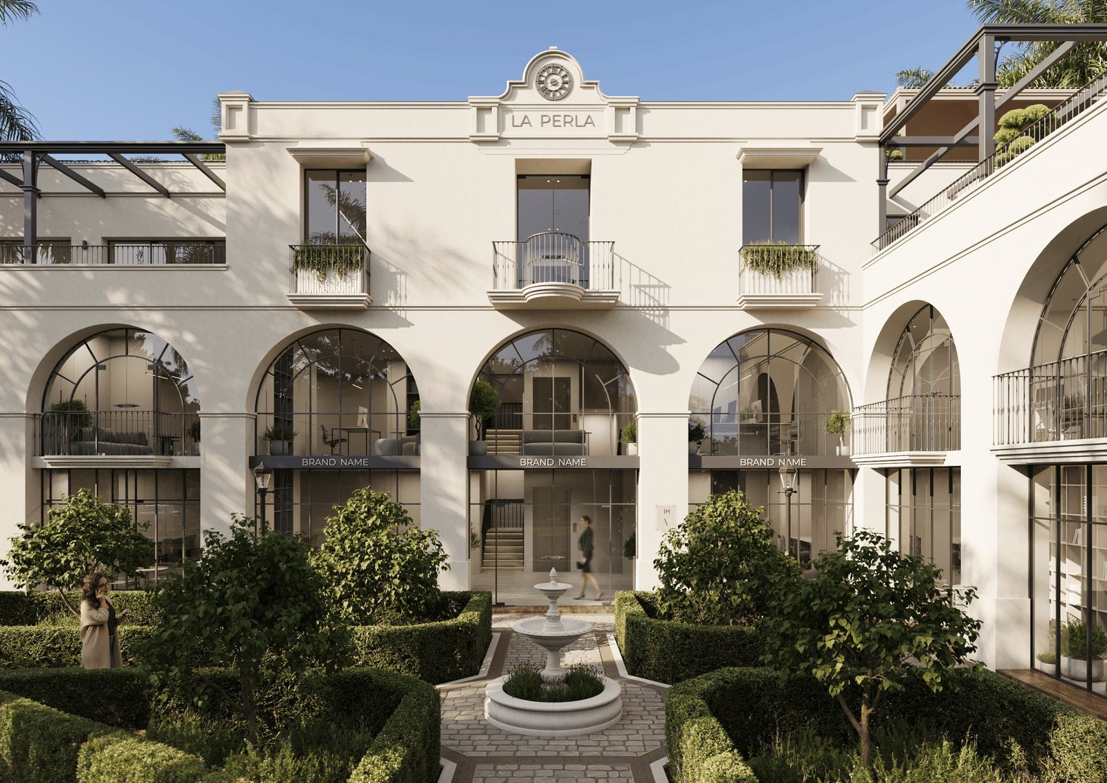 Elegant La Perla courtyard facade with arched windows, balconies, clipped hedges and a fountain in Benahavís, Málaga - The Estates
