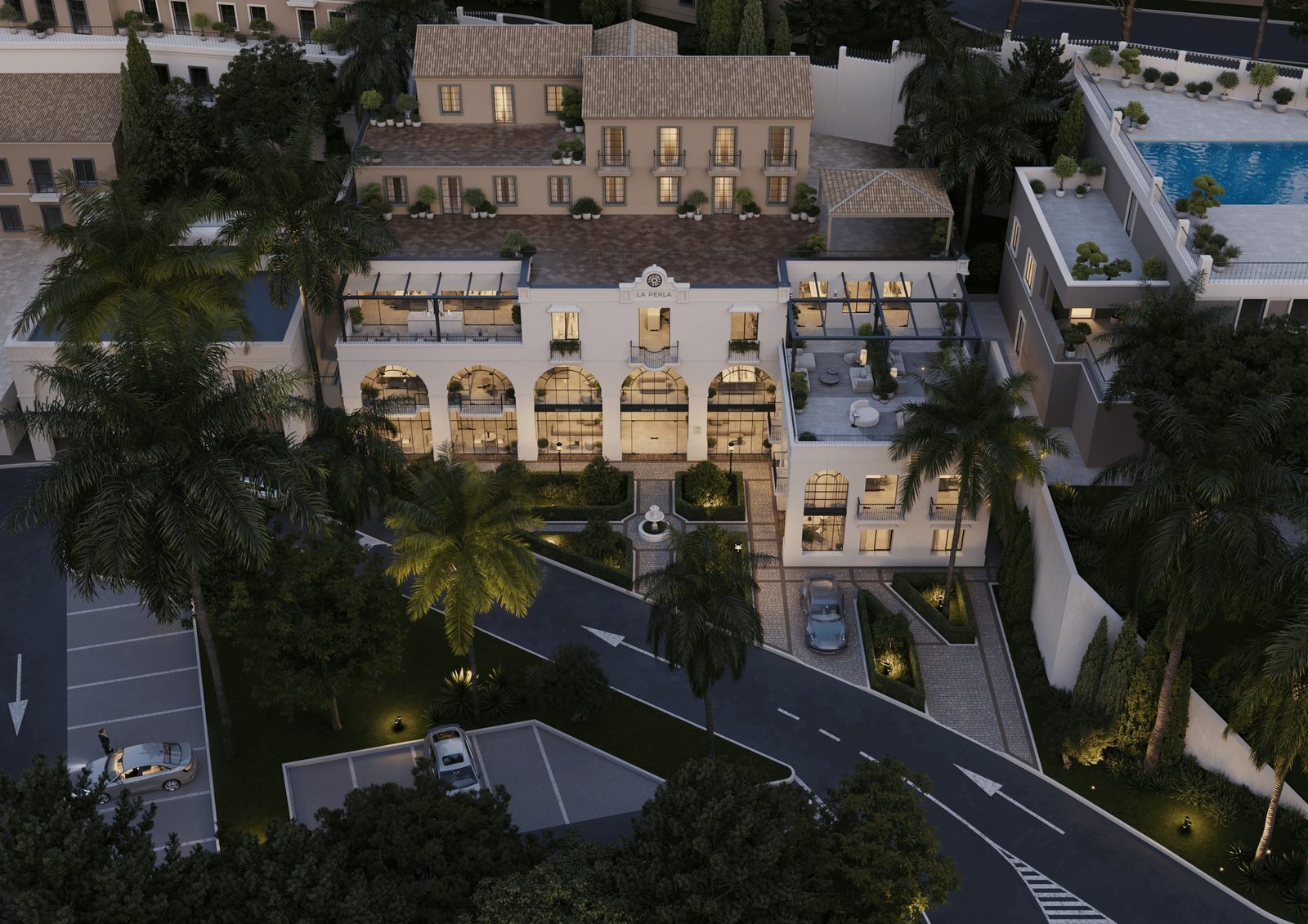 Aerial view of a luxury residential complex with courtyards, palm trees and pool in Benahavís, Málaga - The Estates