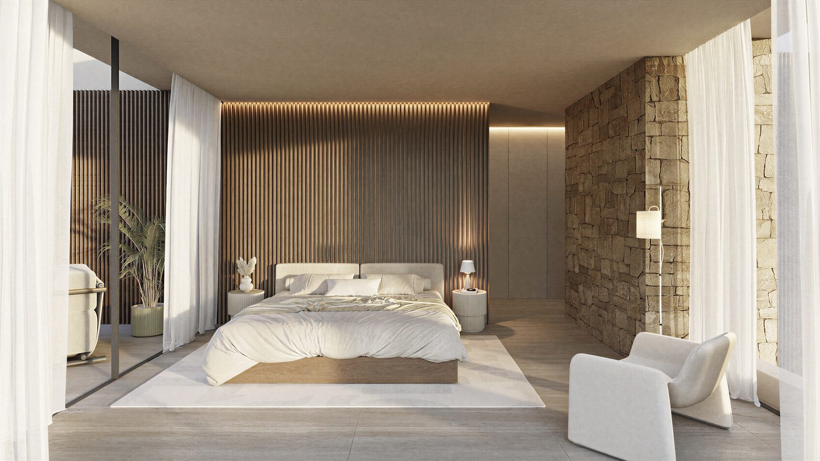 Contemporary master bedroom with stone wall and floor-to-ceiling curtains in a 4-bedroom villa in Benissa - The Estates