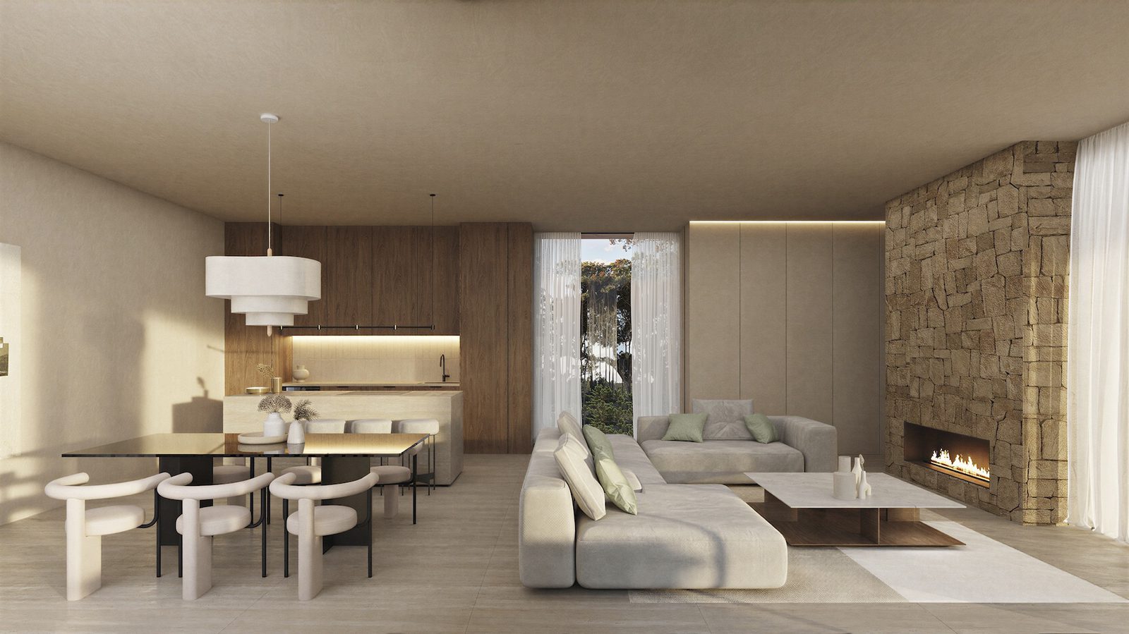 Open-plan living, dining and kitchen interior with stone fireplace of a 4-bedroom villa in Benissa - The Estates