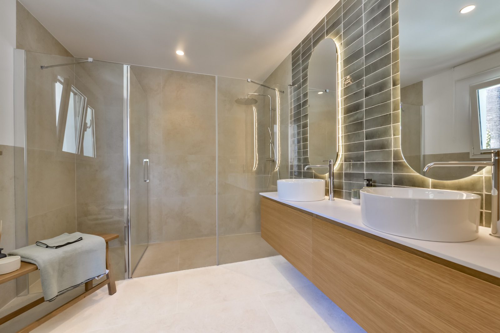 A modern bathroom with a walk-in shower in a 3-bedroom villa in Altea - The Estates