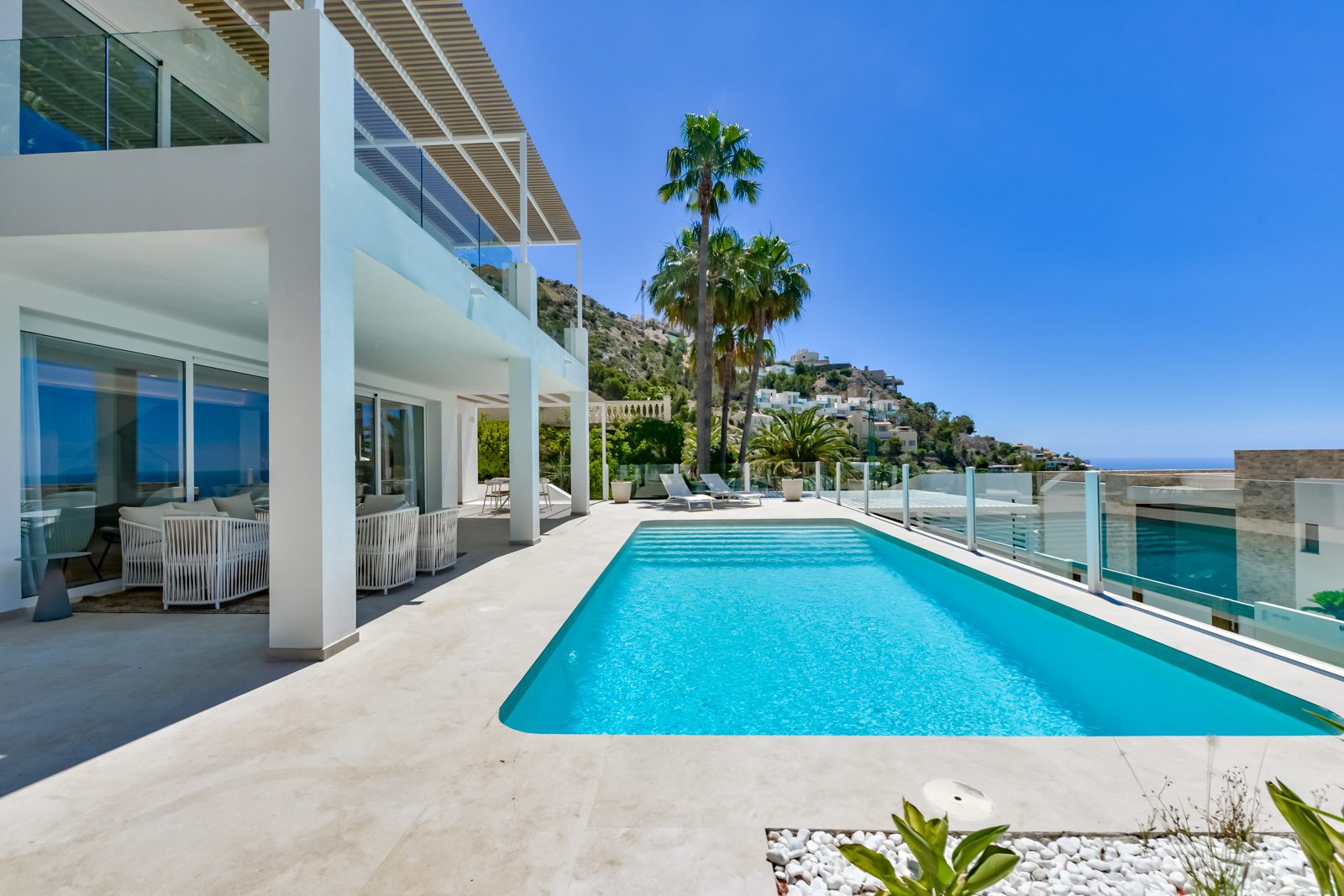 A luxurious pool and terrace area of a 3-bedroom villa in Altea - The Estates