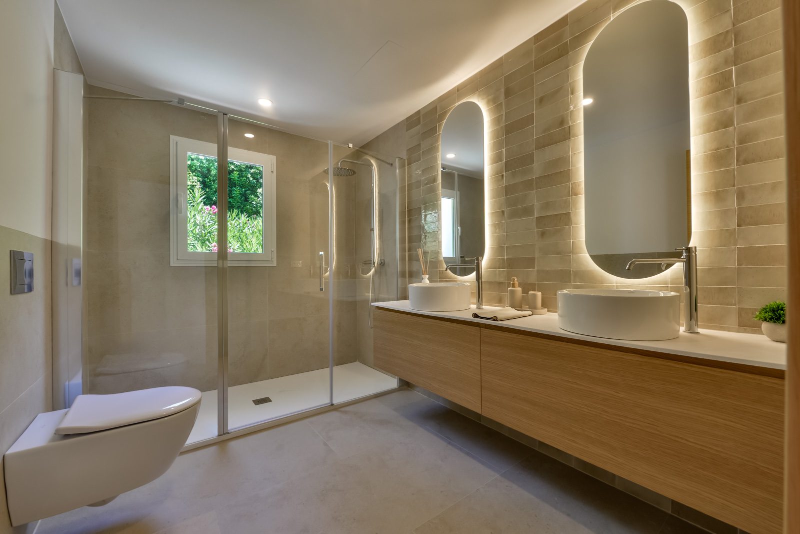 Stylish bathroom with double sinks and a walk-in shower in a 3-bedroom villa in Altea - The Estates