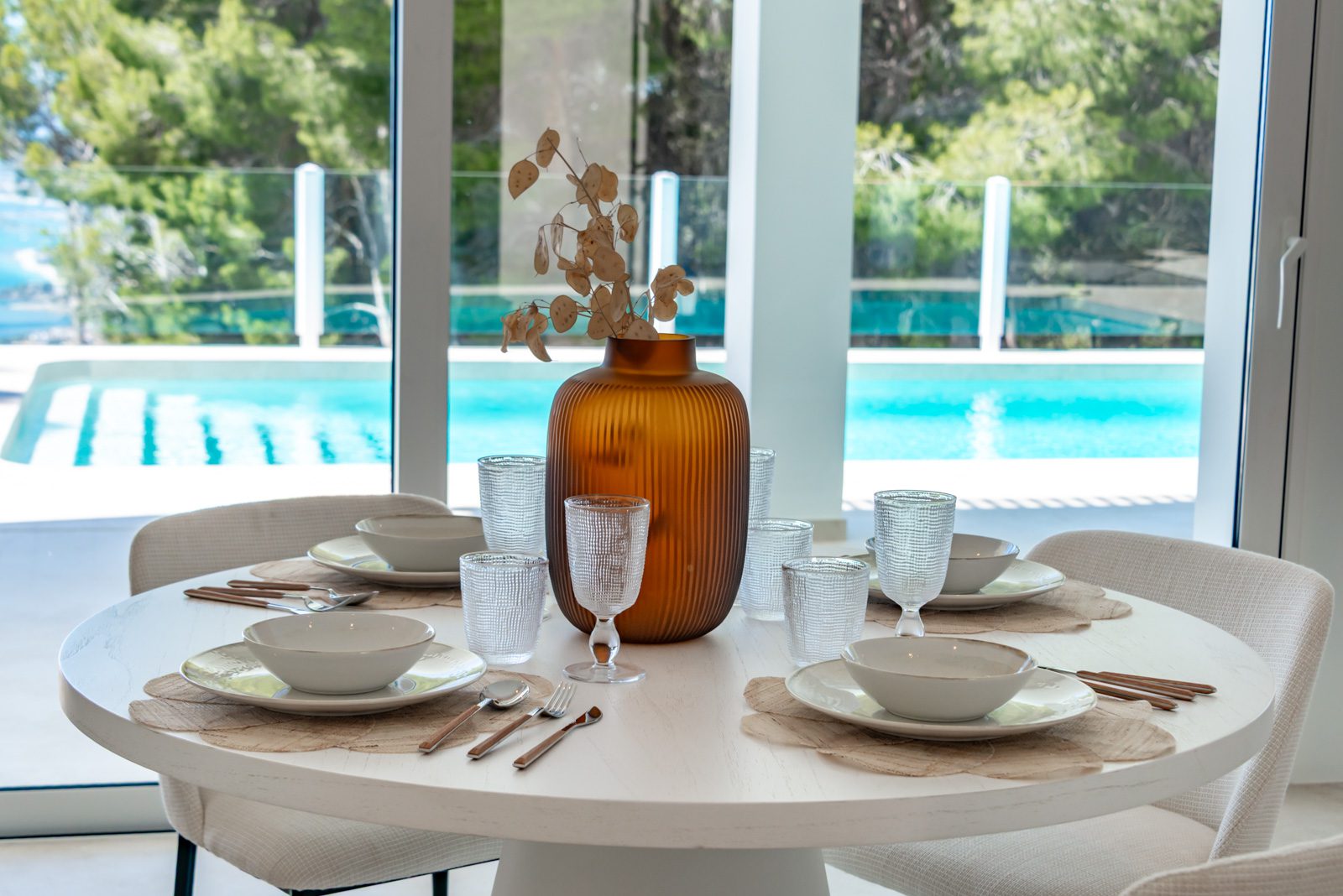 Stylish dining area with sea views inside a 3-bedroom villa in Altea - The Estates