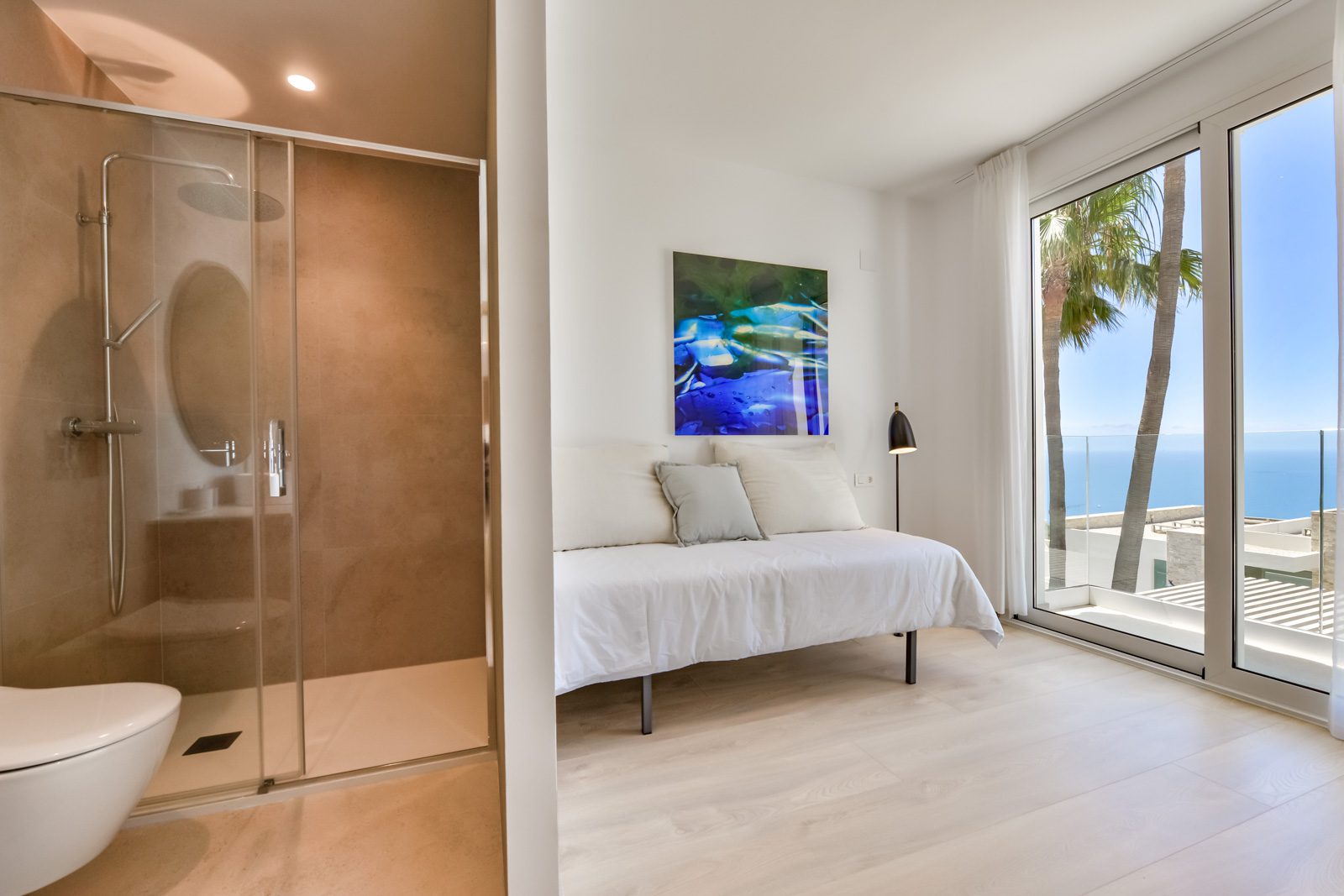 A modern bathroom and bedroom with sea views in a 3-bedroom villa in Altea - The Estates