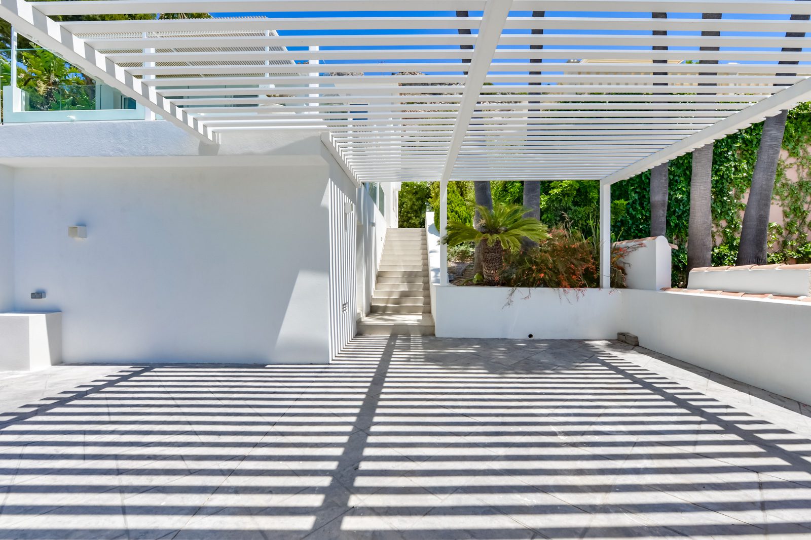 A shaded terrace with modern pergola design at a 3-bedroom villa in Altea - The Estates