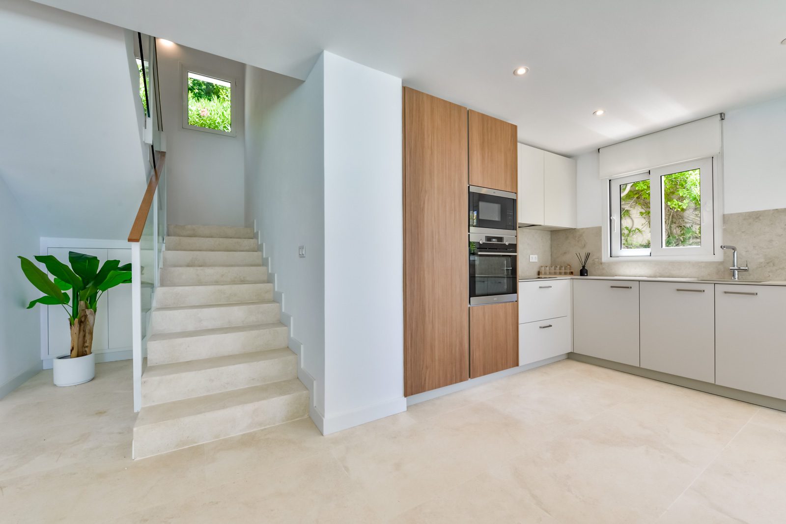 Modern kitchen with staircase in a 3-bedroom villa in Altea - The Estates