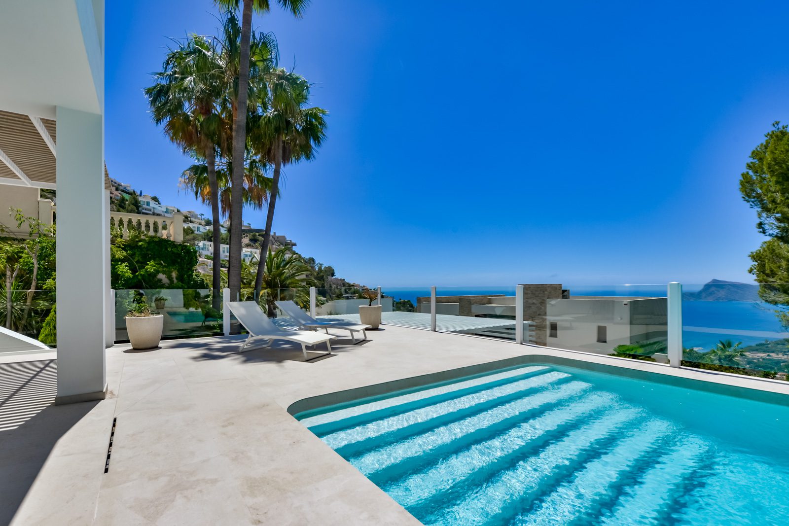 A luxurious pool and terrace with stunning sea views of a 3-bedroom villa in Altea - The Estates