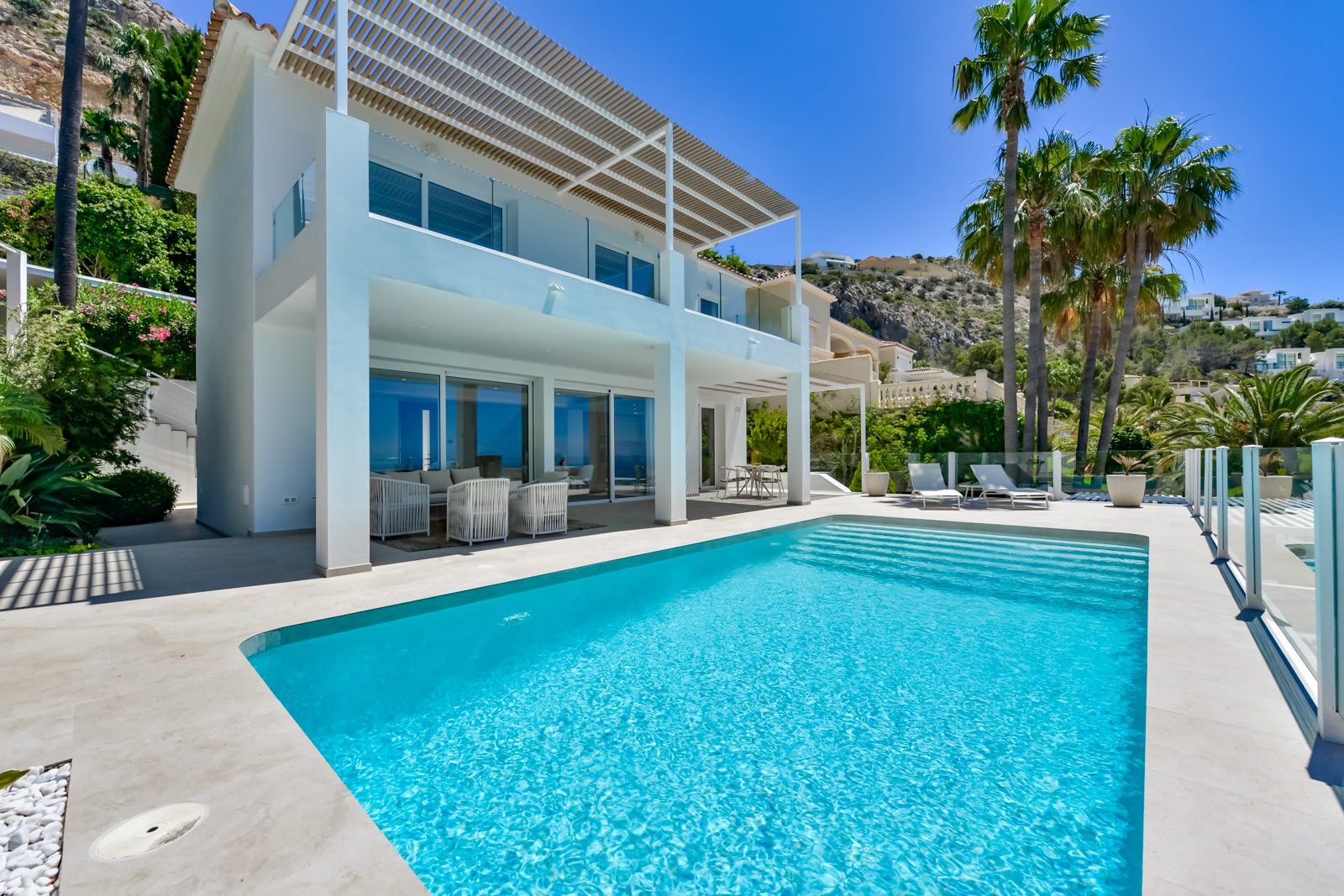 A luxurious pool and terrace area of a 3-bedroom villa in Altea - The Estates