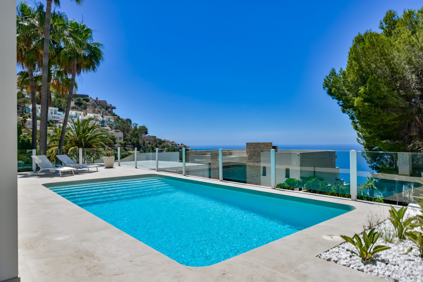 A sparkling pool and terrace with stunning sea views at a 3-bedroom villa in Altea - The Estates
