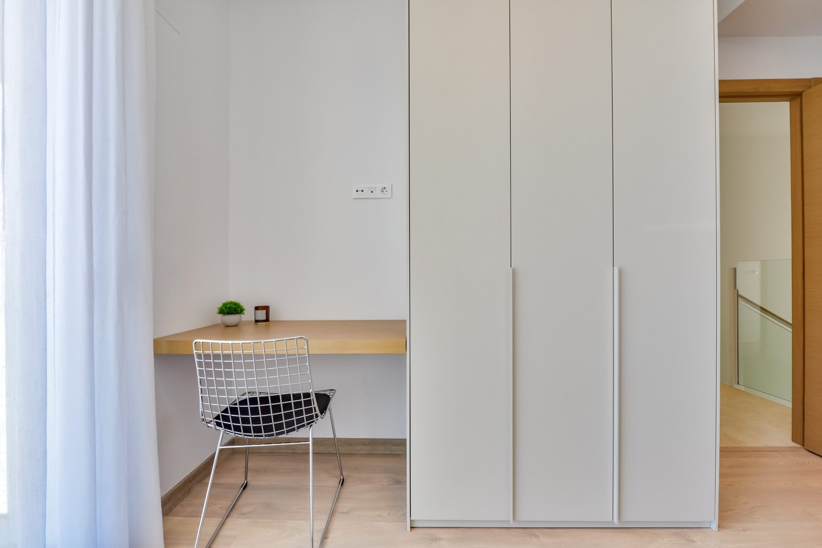 A modern built-in desk and chair in a bedroom of a 3-bedroom villa in Altea - The Estates