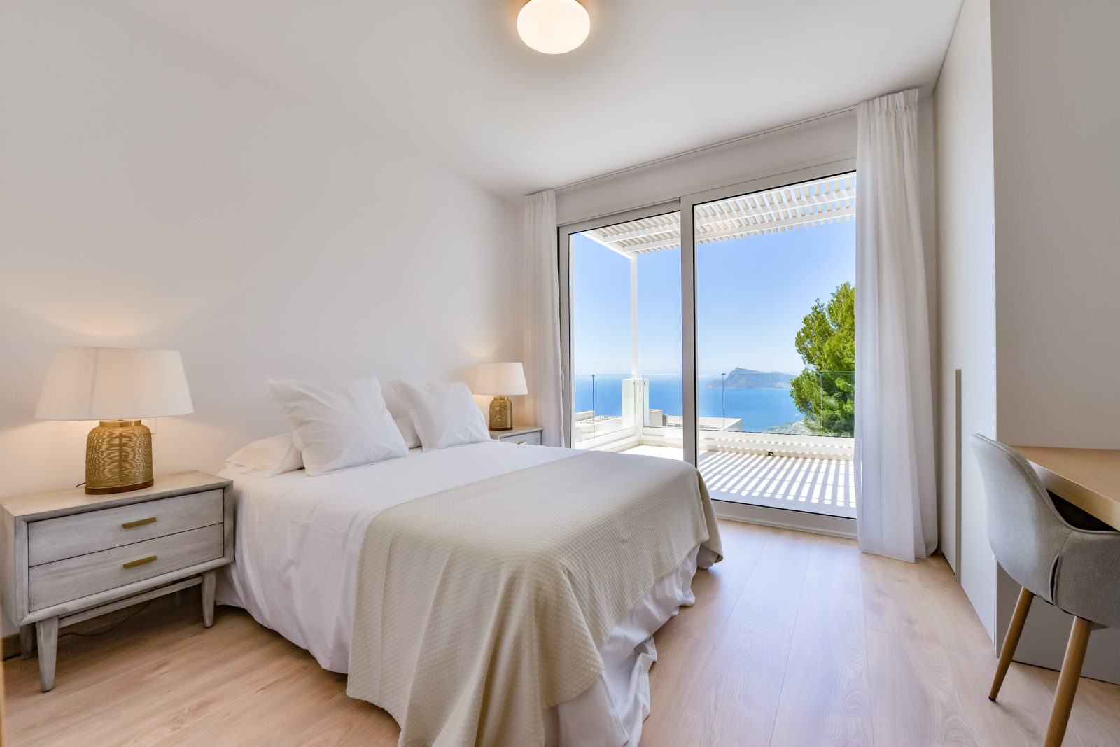 A bright bedroom with sea views in a 3-bedroom villa in Altea - The Estates